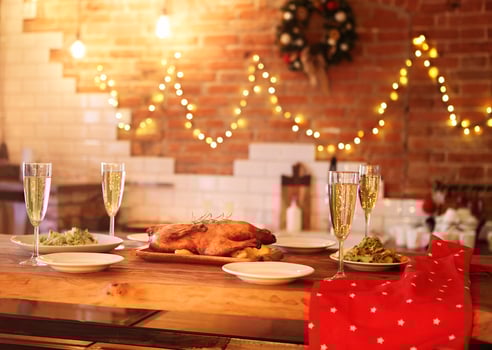 Christmas dinner with roast duck and champagne photo