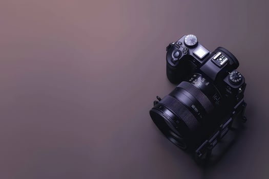 A sleek camera rests elegantly on a smooth surface, ready to capture vibrant moments in the heart of a creative studio photo