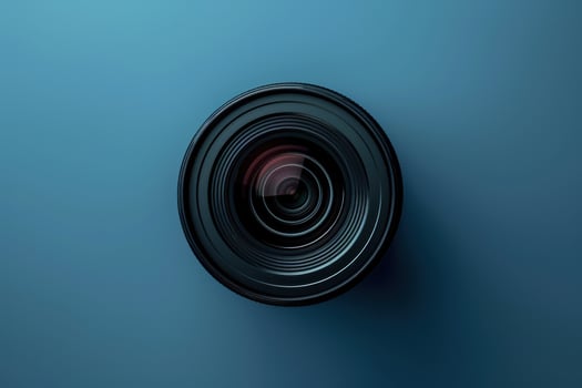 Exploring the intricate design of a camera lens against a serene blue backdrop photo