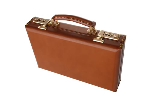 Brown leather suitcase with combination lock and gold locks isolated on white photo