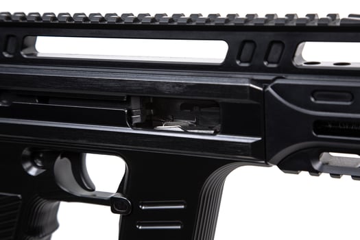 Close-up of the bolt of the carbine. A modern automatic carbine chambered for 9mm pistol caliber. Weapons for the police, army and special units. Isolate on a white back photo