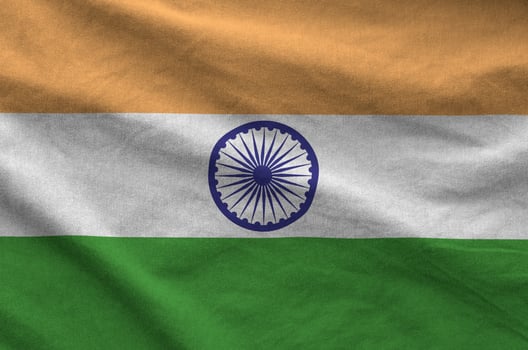 India flag depicted on folded wavy fabric of old cloth photo