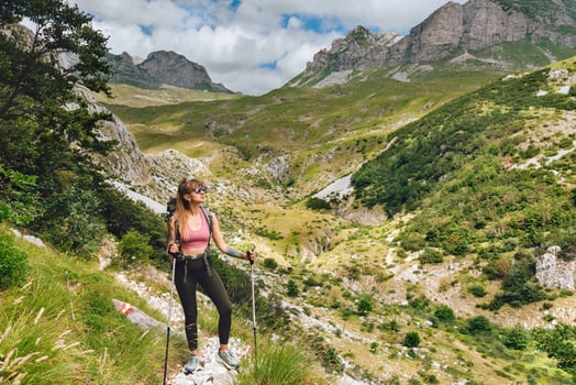 Young Woman Hiker on Rocky Mountain Trail photo
