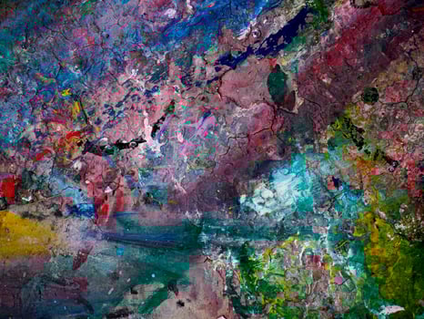 Smeared paint on table with colorful pattern for background photo