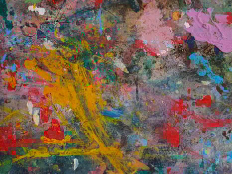 Smeared paint on table with colorful pattern for background photo