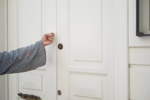 women hand knock the door photo