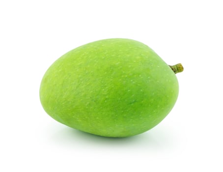 Green mango isolated on a white background photo