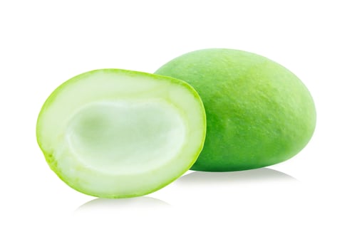 Green mango on white background photo
