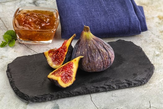 Purple ripe fig with cut photo