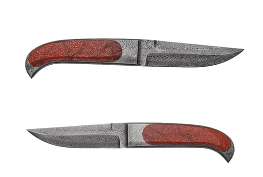 Damascus steel hunting knife isolate on white back photo