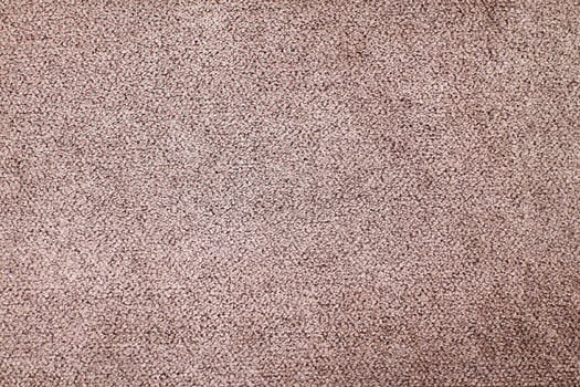 Natural Linen Material Textile Canvas Fabric Texture Background Close-up Detail of Fabric Natural Color Hemp Material Pattern Design Wallpaper. Can be Used as Background or For Graphic Design photo