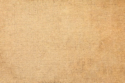 Natural Linen Material Textile Canvas Fabric Texture Background Close-up Detail of Fabric Natural Color Hemp Material Pattern Design Wallpaper. Can be Used as Background or For Graphic Design photo