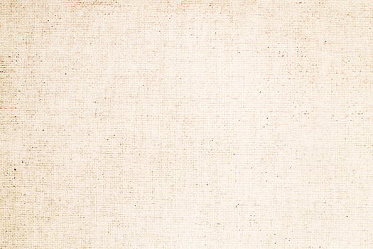 Natural Linen Material Textile Canvas Fabric Texture Background Close-up Detail of Fabric Natural Color Hemp Material Pattern Design Wallpaper. Can be Used as Background or For Graphic Design photo