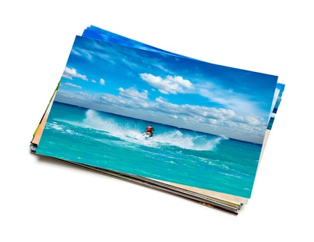 Stack of vacation photos isolated