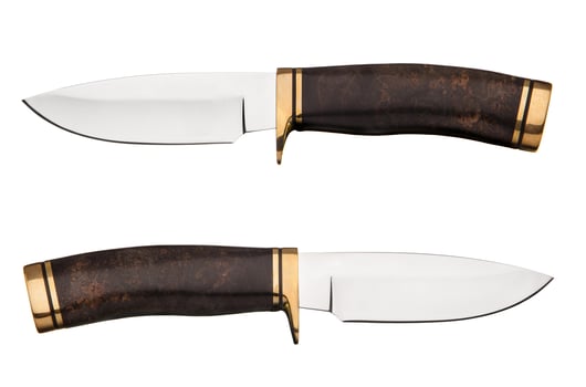 Hunting knife isolated on white photo