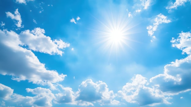 A bright sun shines in a clear blue sky with fluffy white clouds photo