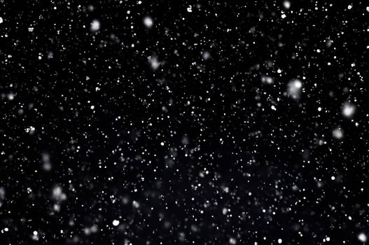 Detailed Snowfall Overlay Image Isolated on Black Background Perfect for Dynamic Visual Effects photo
