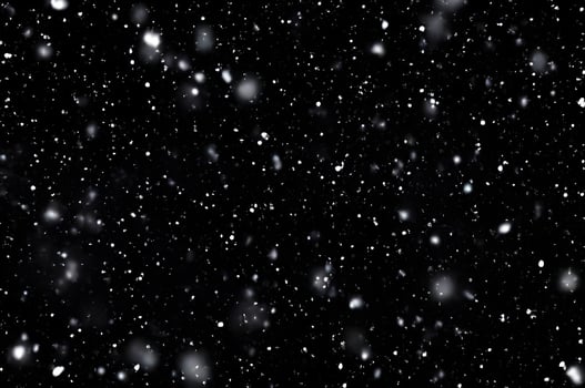 Detailed Snowfall Overlay Image Isolated on Black Background Perfect for Dynamic Visual Effects photo