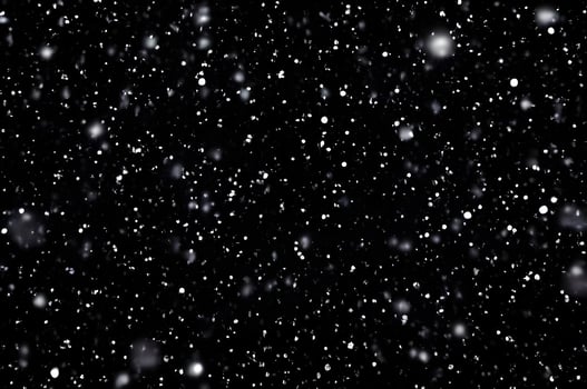Detailed Snowfall Overlay Image Isolated on Black Background Perfect for Dynamic Visual Effects photo