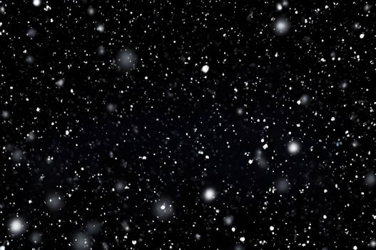 Detailed Snowfall Overlay Image Isolated on Black Background Perfect for Dynamic Visual Effects photo