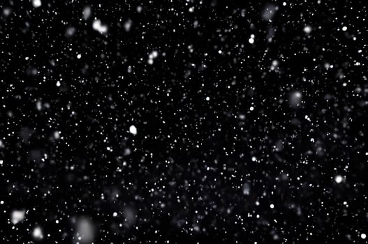 Detailed Snowfall Overlay Image Isolated on Black Background Perfect for Dynamic Visual Effects photo