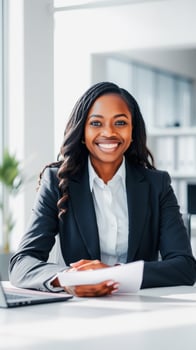 Confident businesswoman in a modern office photo