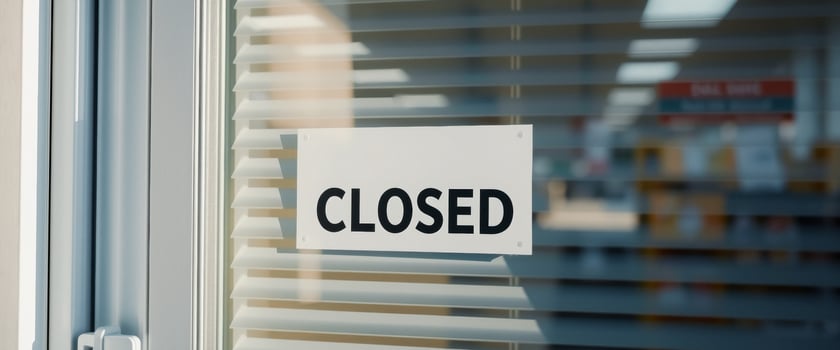 Closed Sign on a Glass Door photo