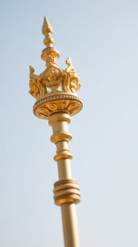 Golden Scepter Against Clear Sky photo