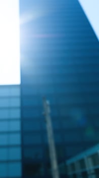 Blue Glass Building With Lens Flare photo