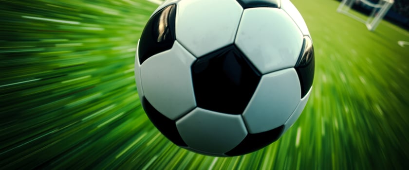 Close up of a soccer ball in mid-air photo