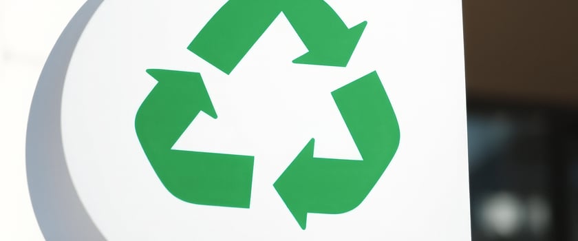 Green Recycling Symbol on White Background photo