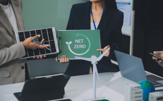 Carbon offset price report CO2 emission. Future growth Net zero waste in ESG ethical SME office protect climate change global warming social issues project. Group of asia people Eco friendly SDGs plan photo