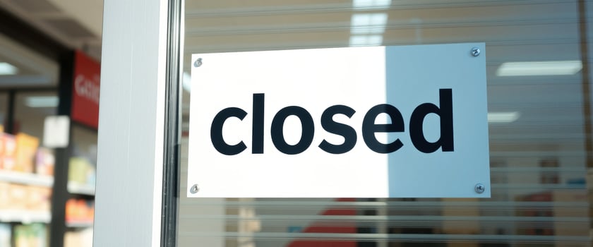 Closed Sign on Glass Door photo