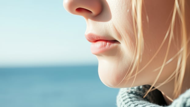 Close Up Of Woman's Mouth And Nose, Looking Away photo
