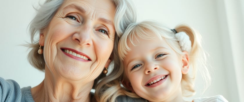 Grandmother and granddaughter smiling together photo