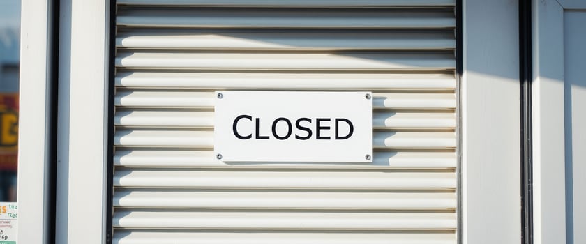 Closed Sign on White Metal Door photo