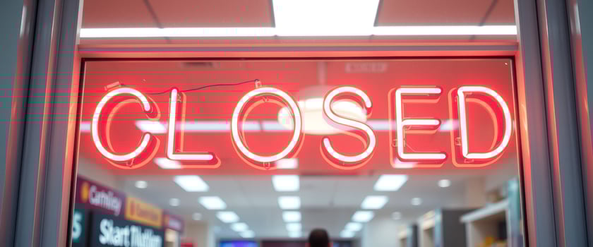 Closed Neon Sign in Window photo