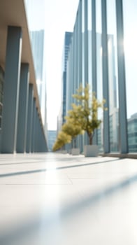 Modern building with glass facade and a patio with a plant photo