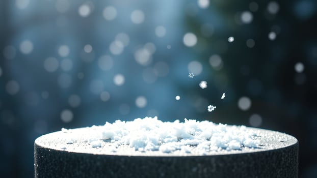 Snowflakes Falling on a Stone Surface photo