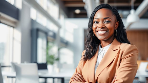 Confident businesswoman smiling in office photo