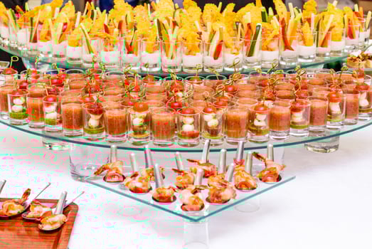 A variety of snacks, canapes and sandwiches on the table. photo