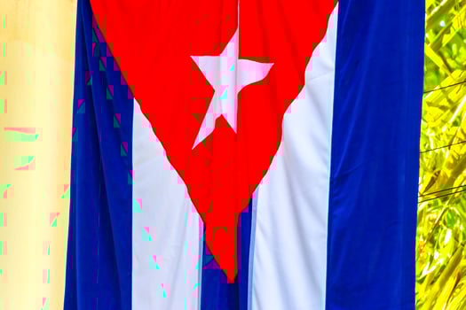 Cuban flag red white blue star Playa del Carmen Mexico. photo