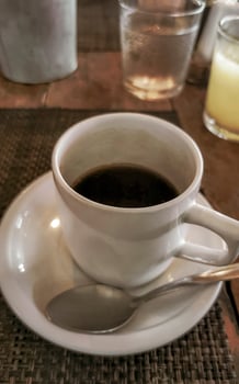 Cup of americano black coffee in restaurant cafe in Mexico. photo