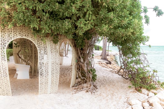 Tropical beach with beautifully designed pergola in Mexico. photo