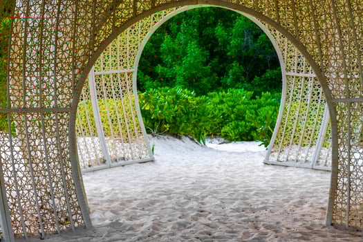 Tropical beach with beautifully designed pergola in Mexico. photo