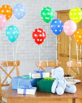Baby shower. Sweets and presents on the table. photo
