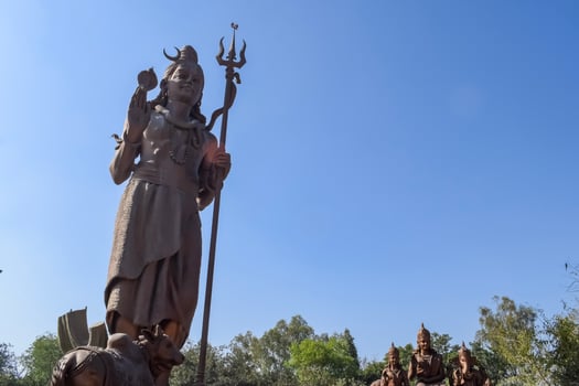 Big statue of Lord Shiv near Delhi International airport, Delhi, India, Lord Shiv big statue touching sky at main highway Mahipalpur, Delhi photo