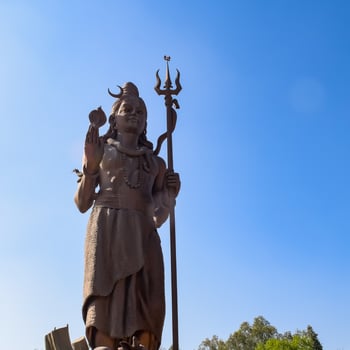 Big statue of Lord Shiv near Delhi International airport, Delhi, India, Lord Shiv big statue touching sky at main highway Mahipalpur, Delhi photo