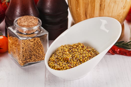 Spicy mustard sauce with seeds photo