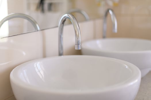 Bathroom sink with faucet, closeup photo